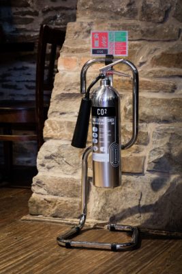 fire extinguisher on wall